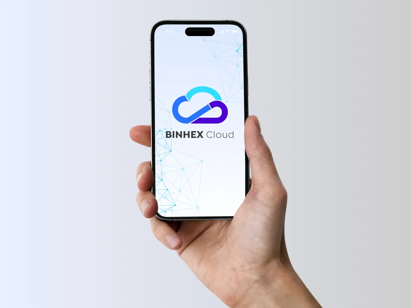 A hand holding a cell phone displaying the Binhex Cloud logo