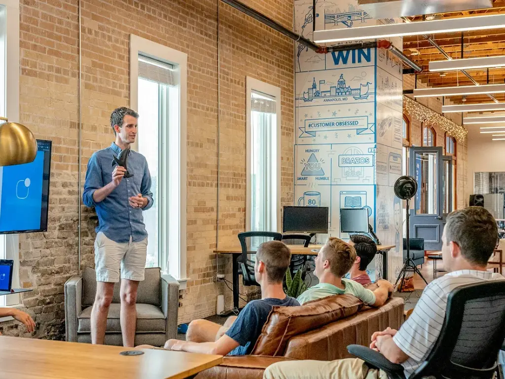 Speaker presenting to an audience at an event
