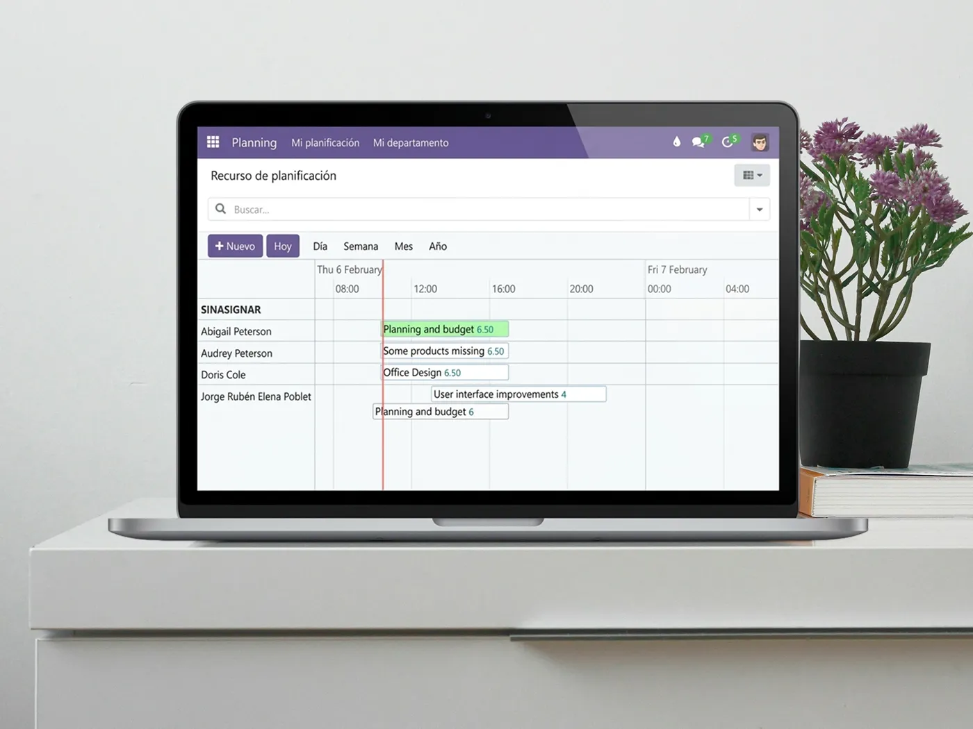 A computer where we can view a schedule for different employees